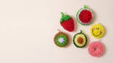 All six frubbies kitchen scrubbers laid out on a cream background