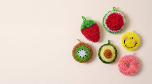 All six frubbies kitchen scrubbers laid out on a cream background