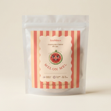 Melon Mel in its striped frubbies pouch