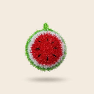 Melon Mel watermelon-slice kitchen scrubber in pink with black seeds and a green rind