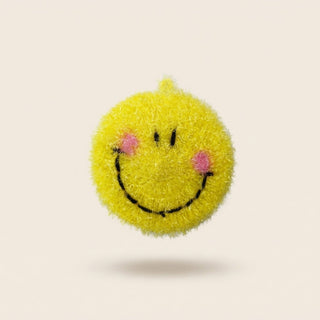Smiley kitchen scrubber, a round yellow face with pink cheeks
