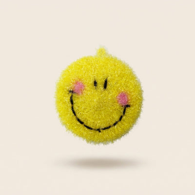 Smiley kitchen scrubber, a round yellow face with pink cheeks
