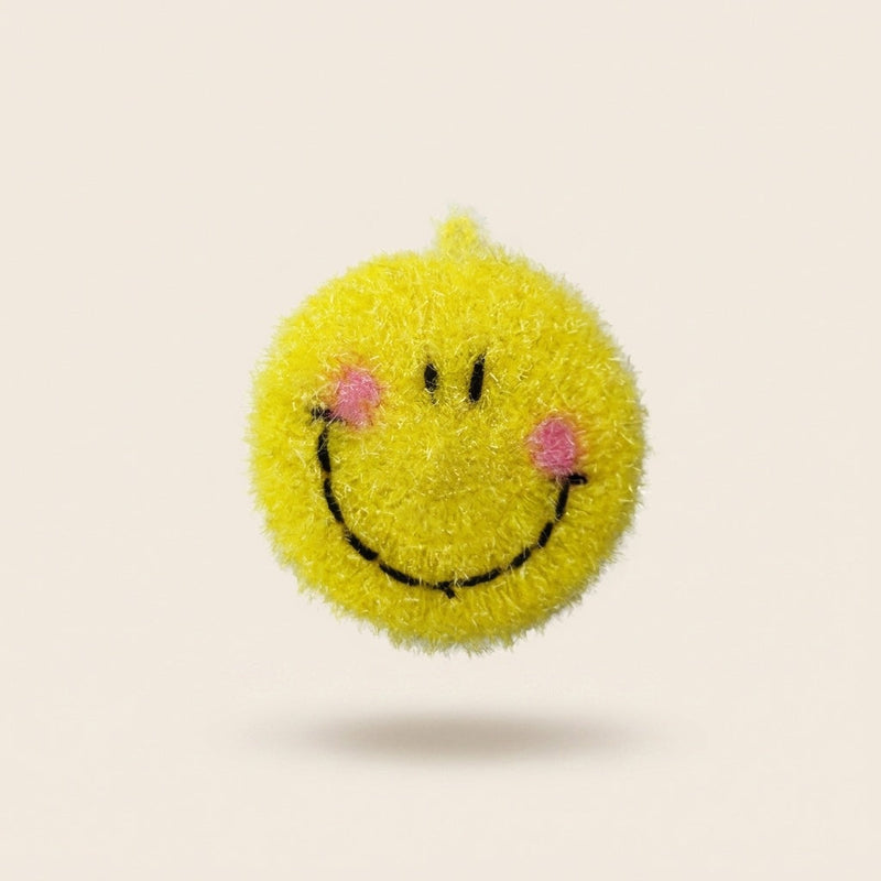 Smiley kitchen scrubber, a round yellow face with pink cheeks