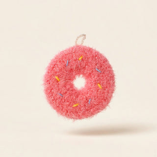 Sprinkles donut-shaped kitchen scrubber in pink yarn with coloured sprinkles