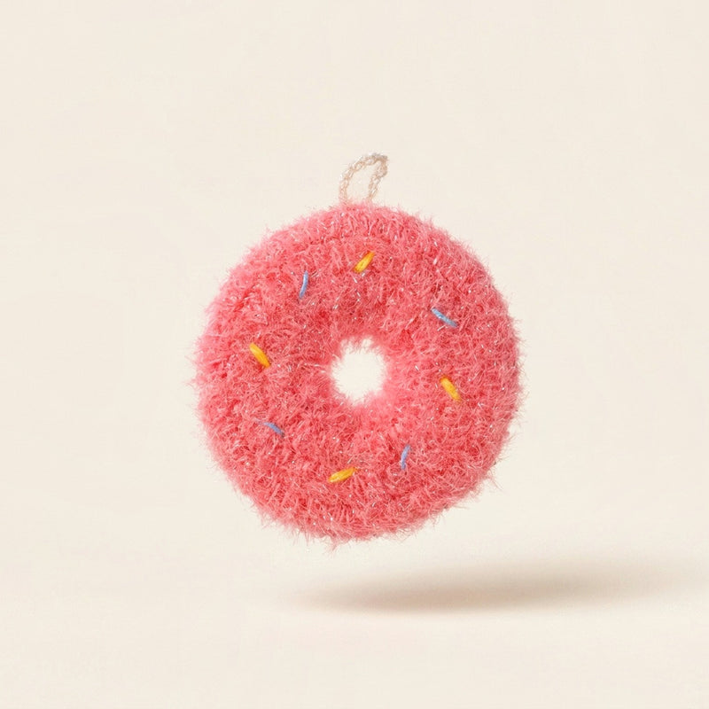 Sprinkles donut-shaped kitchen scrubber in pink yarn with coloured sprinkles